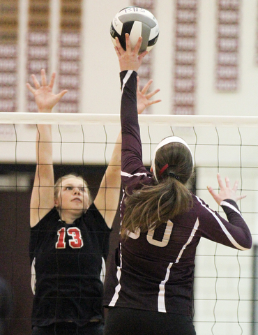 William D. Lewis The Vindicator  Canfield's Morgan Cleevely(13) blocks a shot from Boardman's Ashley Clark(30) during 10-9-17 action at Boardman.