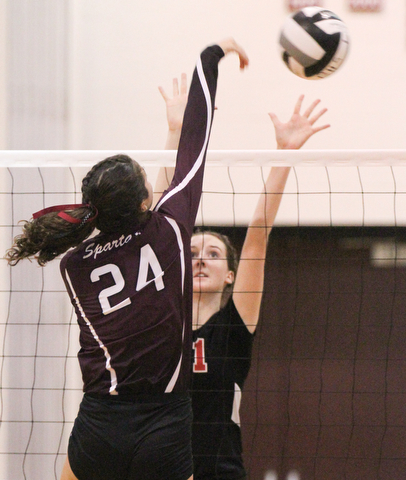 William D. Lewis The Vindicator  Canfield's Alexis Metille(21) ) blocks a shot from Boardman'sKatie Stamp(24) during 10-9-17 action at Boardman.