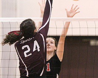 William D. Lewis The Vindicator Canfield's Alexis Metille(21) ) blocks a shot from Boardman'sKatie Stamp(24) during 10-9-17 action at Boardman.