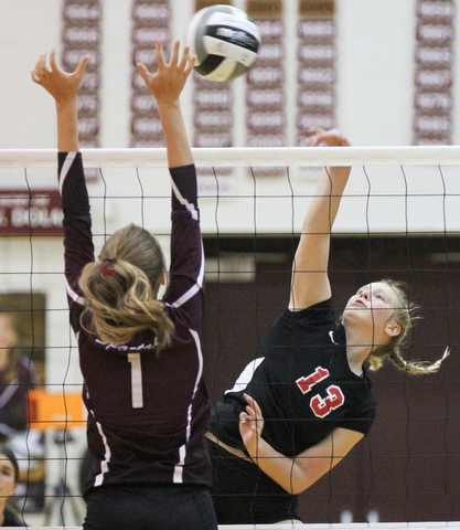 William D. Lewis The Vindicator  Canfield's Morgan Cleevely(13) shoots past Boardman's Carly Zilavy(1) during 10-9-17 action at Boardman.