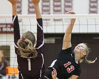 William D. Lewis The Vindicator Canfield's Morgan Cleevely(13) shoots past Boardman's Carly Zilavy(1) during 10-9-17 action at Boardman.