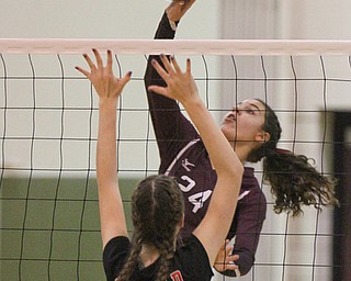 William D. Lewis The Vindicator Canfield's Alexis Metille(21) blocks a shot from Boardman's Katie Stamp(24)) during 10-9-17 action at Boardman.
