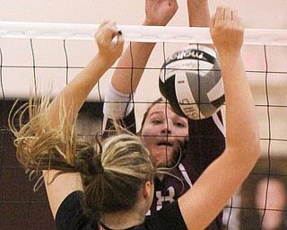 William D. Lewis The Vindicator Canfield's Natalie Maras(23)) tries to block Boardman's Maria torres(28)) during 10-9-17 action at Boardman.