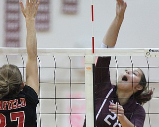William D. Lewis The Vindicator Canfield's Abbi Havrilla(27) tries to block Boardman's Maria torres(28)) during 10-9-17 action at Boardman.