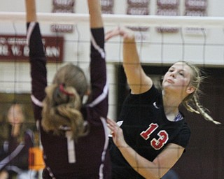 William D. Lewis The Vindicator Canfield's Morgan Cleevely(13) shoots past Boardman's Carly Zilavy(1) during 10-9-17 action at Boardman.