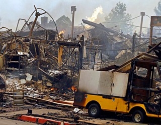 The Hilton hotel is destroyed Monday, Oct. 9, 2017, in Santa Rosa, Calif. Wildfires whipped by powerful winds swept through Northern California early Monday, sending residents on a headlong flight to safety through smoke and flames as homes burned. (AP Photo/Ben Margot)