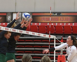 Youngstown State University Outside Hitter Sam Brown (20) spikes the ball during the first set as Wright State University takes on Youngstown State University, Wednesday, Oct. 11, 2017, at the Beeghly Center at Youngstown State University in Youngstown. The Raiders won the set 3-1, loosing set 1 30-32 and winning set 2 25-16, set 3 25-17 and set 4 25-22...(Nikos Frazier | The Vindicator)..
