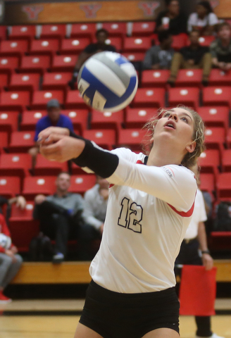 Youngstown State University Outside Hitter Margaux Thompson (12) hits the ball during the third set as Wright State University takes on Youngstown State University, Wednesday, Oct. 11, 2017, at the Beeghly Center at Youngstown State University in Youngstown. The Raiders won the set 3-1, loosing set 1 30-32 and winning set 2 25-16, set 3 25-17 and set 4 25-22...(Nikos Frazier | The Vindicator)..