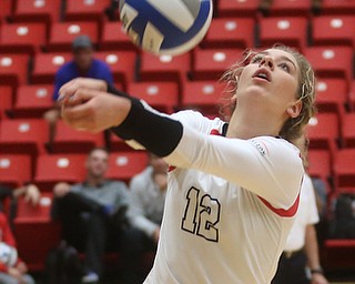 Youngstown State University Outside Hitter Margaux Thompson (12) hits the ball during the third set as Wright State University takes on Youngstown State University, Wednesday, Oct. 11, 2017, at the Beeghly Center at Youngstown State University in Youngstown. The Raiders won the set 3-1, loosing set 1 30-32 and winning set 2 25-16, set 3 25-17 and set 4 25-22...(Nikos Frazier | The Vindicator)..