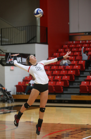 Youngstown State University Outside Hitter Erin Kalahar (10) serves the ball during the third set as Wright State University takes on Youngstown State University, Wednesday, Oct. 11, 2017, at the Beeghly Center at Youngstown State University in Youngstown. The Raiders won the set 3-1, loosing set 1 30-32 and winning set 2 25-16, set 3 25-17 and set 4 25-22...(Nikos Frazier | The Vindicator)..