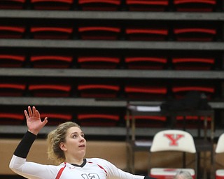 Youngstown State University Outside Hitter Margaux Thompson (12) goes up for the spike during the fourth set as Wright State University takes on Youngstown State University, Wednesday, Oct. 11, 2017, at the Beeghly Center at Youngstown State University in Youngstown. The Raiders won the set 3-1, loosing set 1 30-32 and winning set 2 25-16, set 3 25-17 and set 4 25-22...(Nikos Frazier | The Vindicator)..