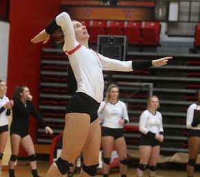 Youngstown State Unversity Setter Libbie Darling (9) serves during the fourth set as Wright State University takes on Youngstown State University, Wednesday, Oct. 11, 2017, at the Beeghly Center at Youngstown State University in Youngstown. The Raiders won the set 3-1, loosing set 1 30-32 and winning set 2 25-16, set 3 25-17 and set 4 25-22...(Nikos Frazier | The Vindicator)..