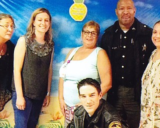 The sixth grade students of Summit Academy Elementary School in Youngstown recently hosted two officers from the Mahoning County Sheriff’s Department. The guests were the first this year to speak to the class during its “Focus on Careers.” Deputy sheriffs Damon Perry and William Bugzavich spoke about the D.A.R.E. program (Drug Abuse Resistance Education) and the importance of making wise decisions in life. They also shared the responsibilities of a deputy sheriff and the jurisdiction they cover. Pictured, standing, from left, are Suzanne Tkac, Celina Wolfe, Laurie Lamancusa, Perry and Doreen Duganne. In front is Bugzavich. 