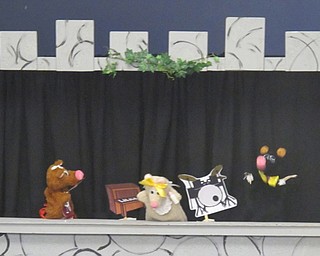 Neighbors | Zack Shively.Three bears rocked out during Boardman library's Puppet Tales rendition of the book "Goldi Rocks and the Three Bears" on Aug 16.