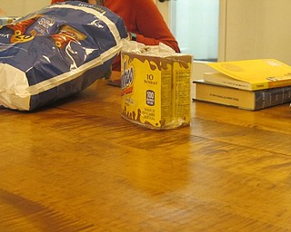 Neighbors | Zack Shively  .The Austintown library offered snacks and drinks to those at their book club.