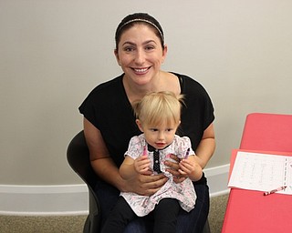 Neighbors | Abby Slanker.Sadie and her mom, Jeanette, enjoyed making a calendar craft after attending the Canfield library’s Baby Brilliant: Tales and Talk for 2s and 3s on Sept. 12.