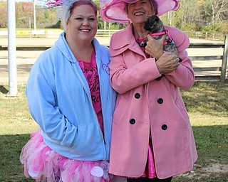 Neighbors | Abby Slanker.Sallie Sullivan (right), a breast cancer survivor, and her daughter, Megan Hruska, were joined by Sullivan’s puppy, Penny, while decked out in pink, and sporting their finest ‘Derby’ hats in support of the fourth annual Survivor Run Hruska organized to honor her mother and other breast cancer survivors and to help spread awareness of early breast cancer detection on Sept. 30.
