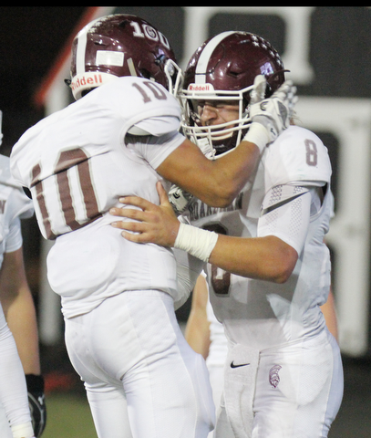 William D. Lewis the Vindicator Boardan QB Mike O'Horo?(8) gets congrats from Maurice Pickard(10) after scoring during 1rst half action 10-12-17 at Stambaugh.