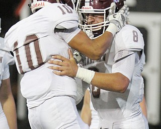 William D. Lewis the Vindicator Boardan QB Mike O'Horo?(8) gets congrats from Maurice Pickard(10) after scoring during 1rst half action 10-12-17 at Stambaugh.