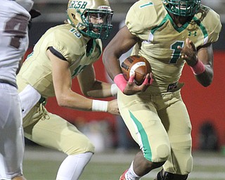 William D. Lewis the Vindicator Ursuline's Trezahn Donlow(1) picks up yardage during 1rst half action 10-12-17 at Stambaugh.