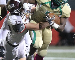William D. Lewis the Vindicator BUrsuline'sJoe Floyd(7) is stopped by Boardman'sNeil Bevacqua?(32) during 1rst half action 10-12-17 at Stambaugh.