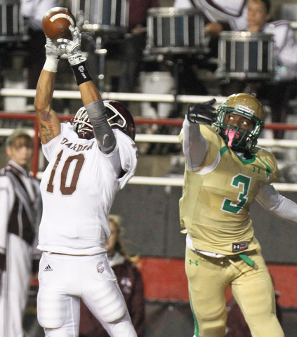 William D. Lewis the Vindicator Boardman's  Maurice Pickard(10) ipicks of a pass intended for Ursuline's James Phillips(3) during 1rst half action 10-12-17 at Stambaugh.