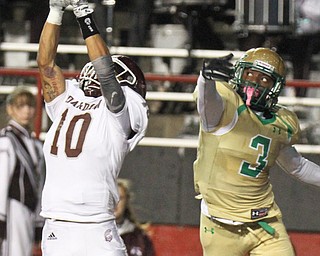 William D. Lewis the Vindicator Boardman's  Maurice Pickard(10) ipicks of a pass intended for Ursuline's James Phillips(3) during 1rst half action 10-12-17 at Stambaugh.