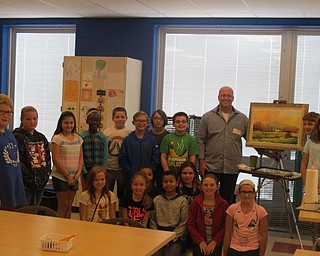 Neighbors | Zack Shively.Painter Chris Leeper visted Jennifer Houston's fifth-grade class on Oct. 4 to demonstrate some of his works and paint a picture for them. Leeper stood next to his finished painted along with Houston's class. He made the painting in thirty minutes during class.