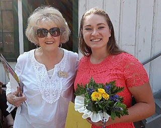 Neighbors | Submitted .Holborn Herb Growers Guild founding member Carrie Bookwalter-Burkey congratulated Jessica Cvelbar, recipient of the $1,000 college scholarship..