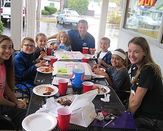 Neighbors | Zack Shively.Poland Union Elementary treated seven students to a pizza party at Cocca's Pizza on Oct. 6. Five Union students were selected at random to attend the event. Two high school students also got to attend, as they participate in the school's Big Dog-Little Dog program where the high school students assist the elementary students in learning. Pictured are, from left, Alea Nicholudis, Jacob Kez, Bailey Hink, Kinsy Schmid, Principal Michael Masucci, Savva Hazimihalis, Ella Mathew and Katie Masucci.