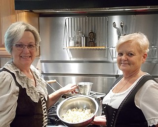 St. Thomas the Apostle Catholic Church, 4453 Warren-Sharon Road, Vienna, will host an Oktoberfest German dinner from 4 to 6:30 p.m. Saturday. Cost is $10 for adults and $5 for children under 12. Menu includes pork loin roast with gravy, spaetzle (homemade German dumplings), sweet and sour red cabbage, chunky applesauce and Black Forest cherry cake. Dine in or takeout. Patrons may bring their own beverages. Pictured, above, from left, are cooks Karen Krause and Val Seaborn preparing spaetzle.