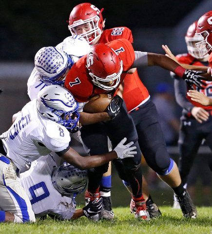 MICHAEL G TAYLOR | THE VINDICATOR- 10-13-17 FOOTBALL Hubbard Eagles vs Struthers Wildcats at Struthers High School, Struthers, OH..1st qtr., Struther's RB Wille Mitchell #7 powers to a 1st down.