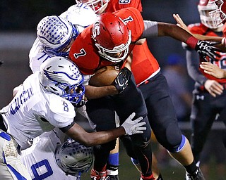 MICHAEL G TAYLOR | THE VINDICATOR- 10-13-17 FOOTBALL Hubbard Eagles vs Struthers Wildcats at Struthers High School, Struthers, OH..1st qtr., Struther's RB Wille Mitchell #7 powers to a 1st down.
