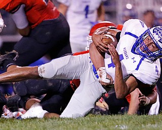 MICHAEL G TAYLOR | THE VINDICATOR- 10-13-17 FOOTBALL Hubbard Eagles vs Struthers Wildcats at Struthers High School, Struthers, OH..1st qtr., Hubbard's QB Davion Daniels #4  dives for the 1st down.