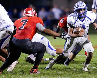MICHAEL G TAYLOR | THE VINDICATOR- 10-13-17 FOOTBALL Hubbard Eagles vs Struthers Wildcats at Struthers High School, Struthers, OH..2nd qtr., Hubbard's Davion Daniels #4 runs for the first as Struther's RB Wille Mitchell #7 pursues.