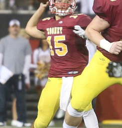 Cardinal Mooney quarterback Antonio Page (15) throws during the second quarter as Warren Harding High School takes on Cardinal Mooney High School, Friday, Oct. 13, 2017, at Stambaugh Stadium in Youngstown...(Nikos Frazier | The Vindicator)..