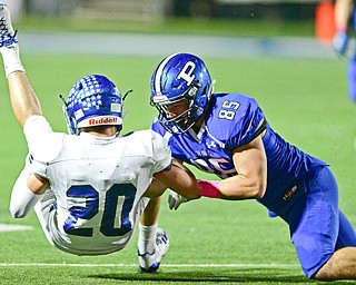 POLAND, OHIO - OCTOBER 13, 2017: Lakeview's Tony Crish, left, is decelerated by Poland's Nick Miller during the first half of their game Friday night at Poland High School. DAVID DERMER | THE VINDICATOR