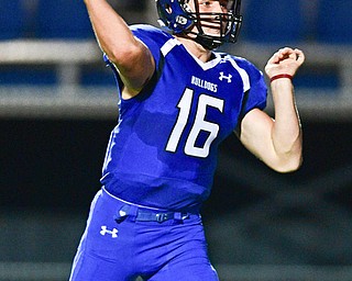 POLAND, OHIO - OCTOBER 13, 2017: Poland quarterback Cole Kosco throws a touchdown pass during the first half of their game Friday night at Poland High School. DAVID DERMER | THE VINDICATOR