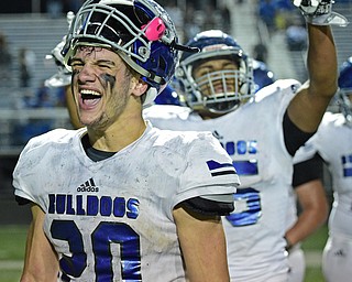 POLAND, OHIO - OCTOBER 13, 2017: Lakeview's Tony Crish, front and Dakota Whitt, back, celebrate after the post game hand shakes after Lakeview defeated Poland 35-30, Friday night at Poland High School. DAVID DERMER | THE VINDICATOR