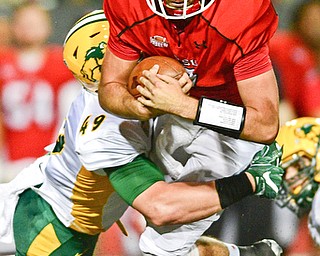 YOUNGSTOWN, OHIO - OCTOBER 14, 2017: Youngstown State's Nathan Mays is tackled by North Dakota State's Nick DeLuca during the first half of their game Saturday night at Stambaugh Stadium. DAVID DERMER | THE VINDICATOR