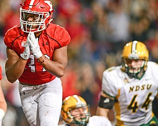 YOUNGSTOWN, OHIO - OCTOBER 14, 2017: Youngstown State's Tevin McCaster celebrates after scoring a touchdown during the second half of their game Saturday night at Stambaugh Stadium. North Dakota State won 27-24. DAVID DERMER | THE VINDICATOR