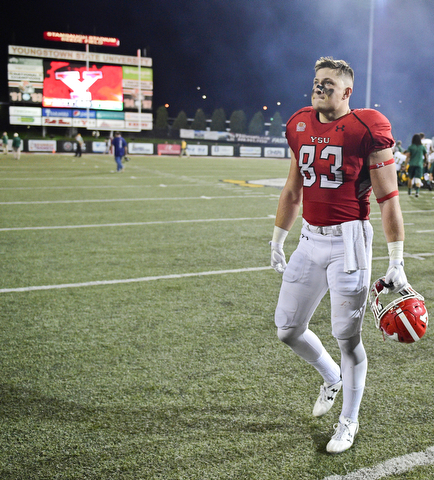 YOUNGSTOWN, OHIO - OCTOBER 14, 2017: Youngstown State's Kevin Rader walks off the field after Youngstown State was defeated by North Dakota State 27-24 in overtime, Saturday night at Stambaugh Stadium. DAVID DERMER | THE VINDICATOR