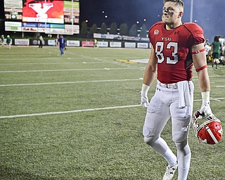 YOUNGSTOWN, OHIO - OCTOBER 14, 2017: Youngstown State's Kevin Rader walks off the field after Youngstown State was defeated by North Dakota State 27-24 in overtime, Saturday night at Stambaugh Stadium. DAVID DERMER | THE VINDICATOR