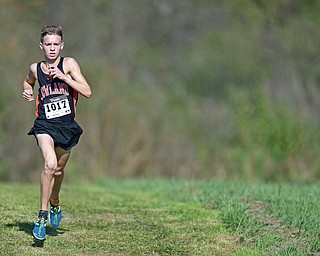 BAZETTA, OHIO - OCTOBER 14, 2017: Howland's Vincent Mauri runs ahead of the pack during the Division 1/2 race during the Sim Earich Invitational, Saturday morning at the Trumbull County Fair Grounds. DAVID DERMER | THE VINDICATOR