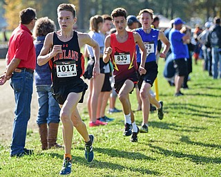BAZETTA, OHIO - OCTOBER 14, 2017: Howland's Vincent Mauri jogs ahead of Canfield's Giovanni Copploe and Grand Valley's John Steimle during the Division 1/2 race during the Sim Earich Invitational, Saturday morning at the Trumbull County Fair Grounds. DAVID DERMER | THE VINDICATOR