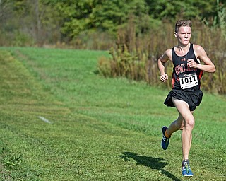 BAZETTA, OHIO - OCTOBER 14, 2017: Howland's Vincent Mauri runs ahead of the pack during the Division 1/2 race during the Sim Earich Invitational, Saturday morning at the Trumbull County Fair Grounds. DAVID DERMER | THE VINDICATOR