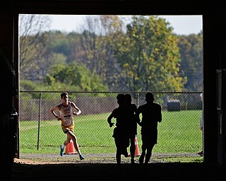 BAZETTA, OHIO - OCTOBER 14, 2017: South Range's Ian Pierson turns into a barn while trying to catch a pack of runners during the Division 1/2 race during the Sim Earich Invitational, Saturday morning at the Trumbull County Fair Grounds. DAVID DERMER | THE VINDICATOR