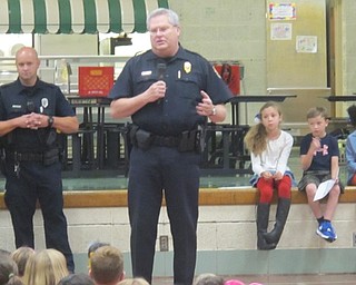 Neighbors | Zack Shively  .Police Captain Donald Lamping spoke to Stadium Elementary students during their Patriot Day assembly on Sept. 11.