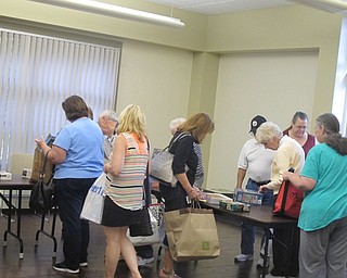 Neighbors | Zack Shively  .Boardman library hosted the Friends of the PLYMC Puzzle Swap on Sept. 13. Twenty people showed up to take puzzles that had been given to the program. All puzzles left over go to the Friends Bookstore located at the Poland library.