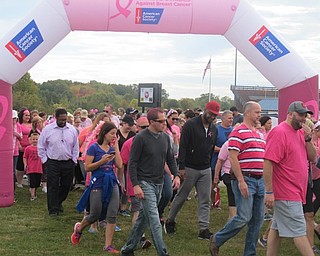 Neighbors | Zack Shively.Participants walked a mile loop around Austintown Fitch campus during the American Cancer Society's Making Strides Against Breast Cancer of Tri-County on Oct. 7. The event honored those who have been affected by breast cancer.